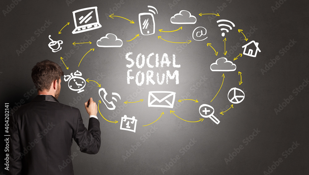 businessman drawing social media icons with SOCIAL FORUM inscription, new media concept businessman drawing social media icons with SOCIAL FORUM inscription, new media concept
