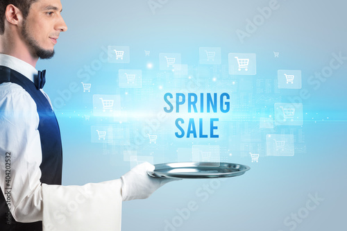 Waiter serving SPRING SALE inscription, online shopping concept