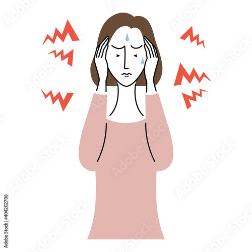 音に過敏になっている女性