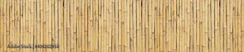 texture of yellow bamboo wall  background from fence