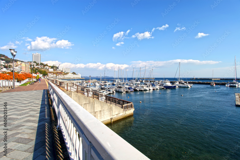 The marina at Atami City in Shizuoka Prefecture in Japan. Atami is an historical seaside resort for people living in Tokyo with sandy beaches and hot springs.