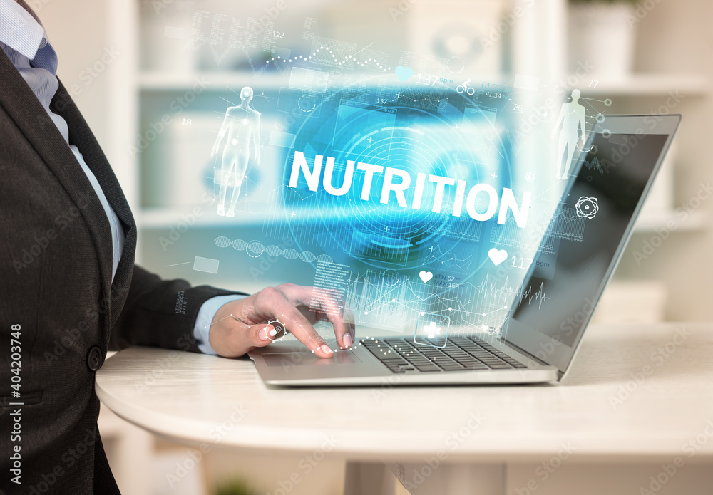 Doctor working a health check with NUTRITION inscription, recording medical test results Doctor working a health check with NUTRITION inscription, recording medical test results