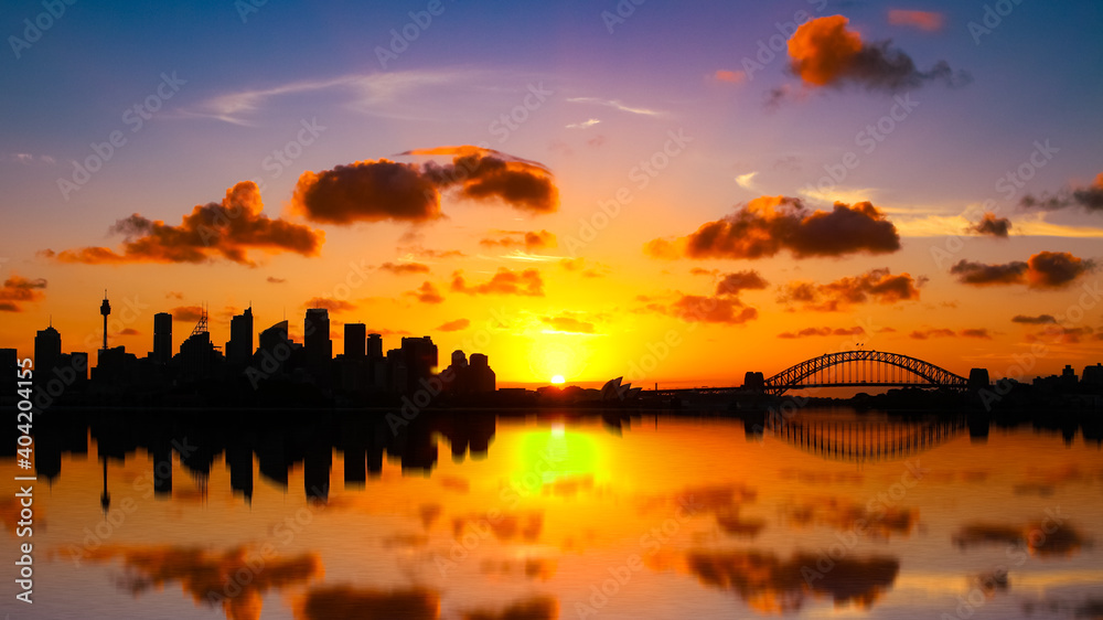 Sydney City CBD Central Business District Down Town and Harbour at Sunset, buildings silhouette with Reflection in Water