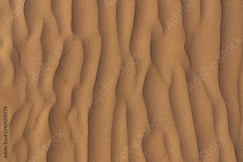 Sand dunes, desert patterns background