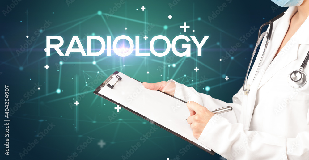 Doctor fills out medical record with RADIOLOGY inscription, medical concept Doctor fills out medical record with RADIOLOGY inscription, medical concept