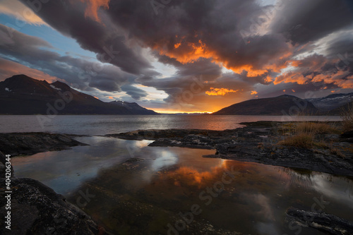 Amazing sunset over a fjord near Tromso, northern Norway