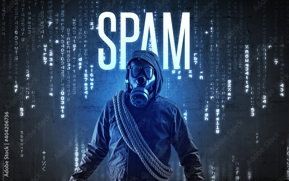 Faceless hacker with SPAM inscription, hacking concept Faceless hacker with SPAM inscription, hacking concept