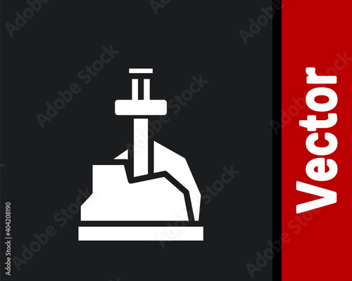 White Sword in the stone icon isolated on black background. Excalibur the sword in the stone from the Arthurian legends. Vector.