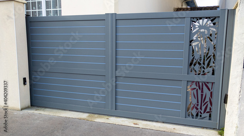 modern grey gate aluminum home portal gray door suburban house in street view