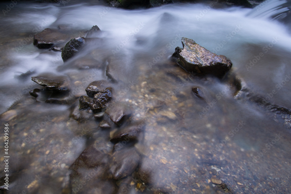water flowing into the water water flowing into the water