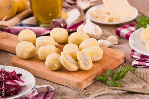 Potato gnocchi stuffed with radicchio and ricotta. 