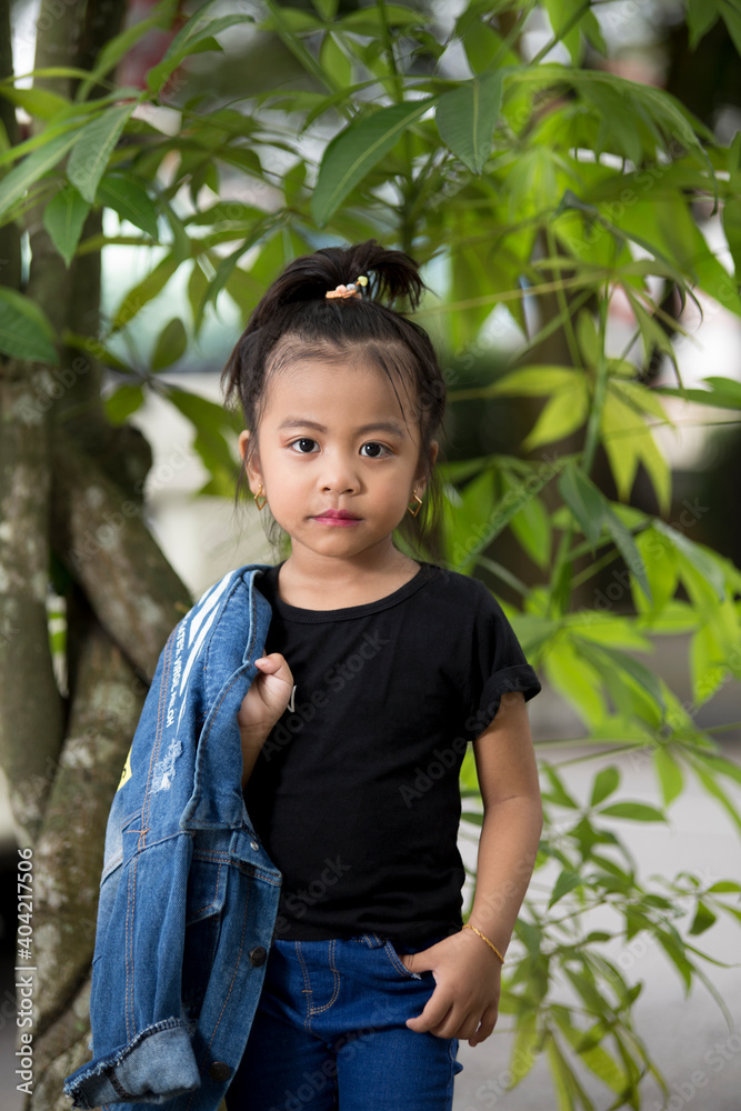 A little girl with her jeans fashion in lovely style