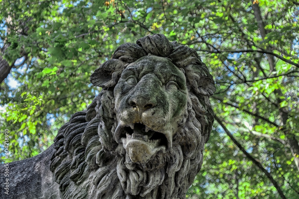 graved stone lion statue 