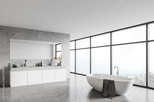 Panoramic white bathroom corner with sink and tub