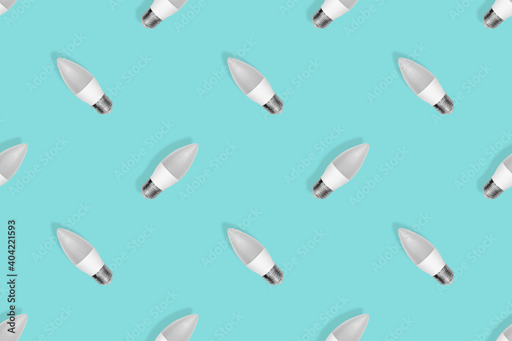 Light bulb seamless pattern. Lighting bulbs on an aquamarine background. Light bulb seamless pattern. Lighting bulbs on an aquamarine background.