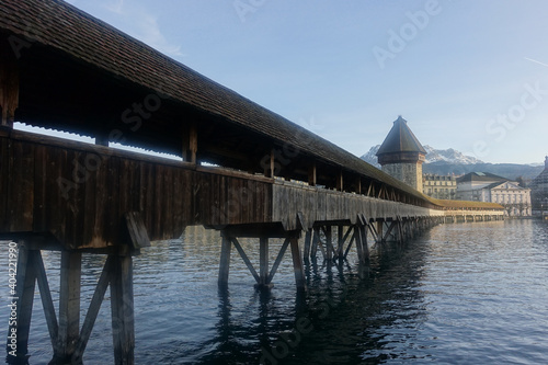 View of Chapel bridge on lake Luzern with blue sky in Luzern, Switzerland, Europe.