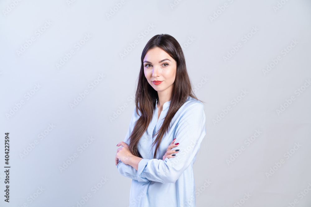 Young business woman on gray background. Young business woman on gray background.