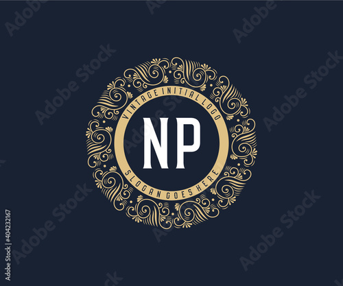 Initial NP Antique retro luxury victorian calligraphic emblem logo with ornamental frame.