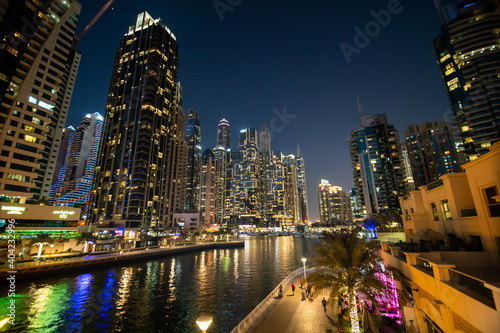 UAE, Dubai - December, 2020: Dubai Marina illuminated at night. United Arab Emirates