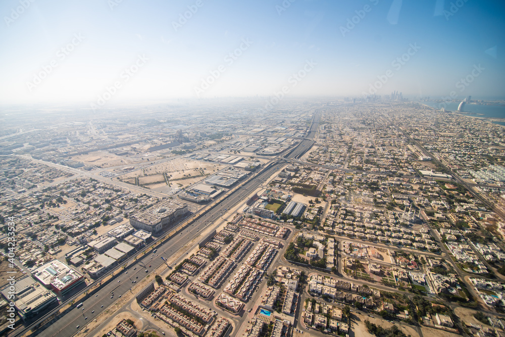 UAE, Dubai - December, 2020: Aerial view of Downtown Dubai from helicopter flight