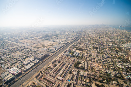 UAE, Dubai - December, 2020: Aerial view of Downtown Dubai from helicopter flight © dianagrytsku