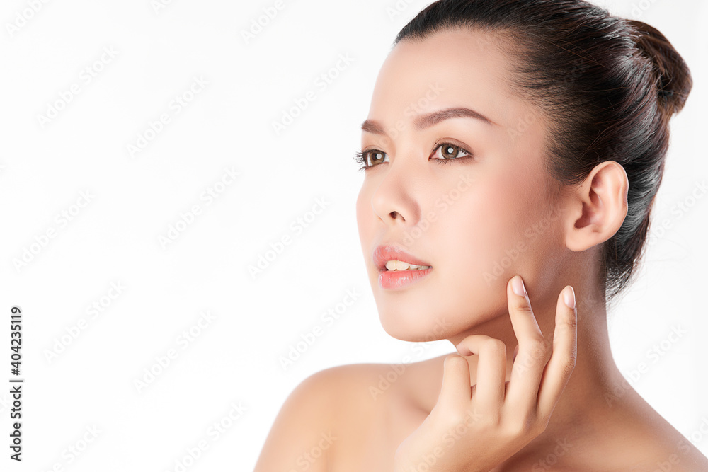 Beautiful Young asian Woman with Clean Fresh Skin, on Pink background, Face care, Facial treatment. Cosmetology, beauty and spa. Asian women portrait Beautiful Young asian Woman with Clean Fresh Skin, on Pink background, Face care, Facial treatment. Cosmetology, beauty and spa. Asian women portrait