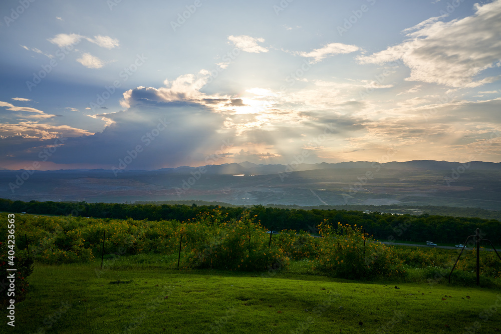 Landscape view of mae mo lampang with sun light rays and evening sky