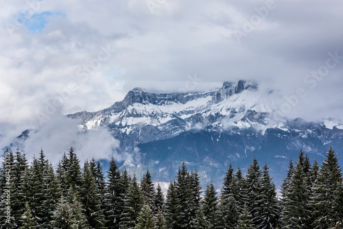 View of the peaks of Mount Tête à l'Ane from Megève on a winter day. Mont Blanc massif chain seen from the French side.