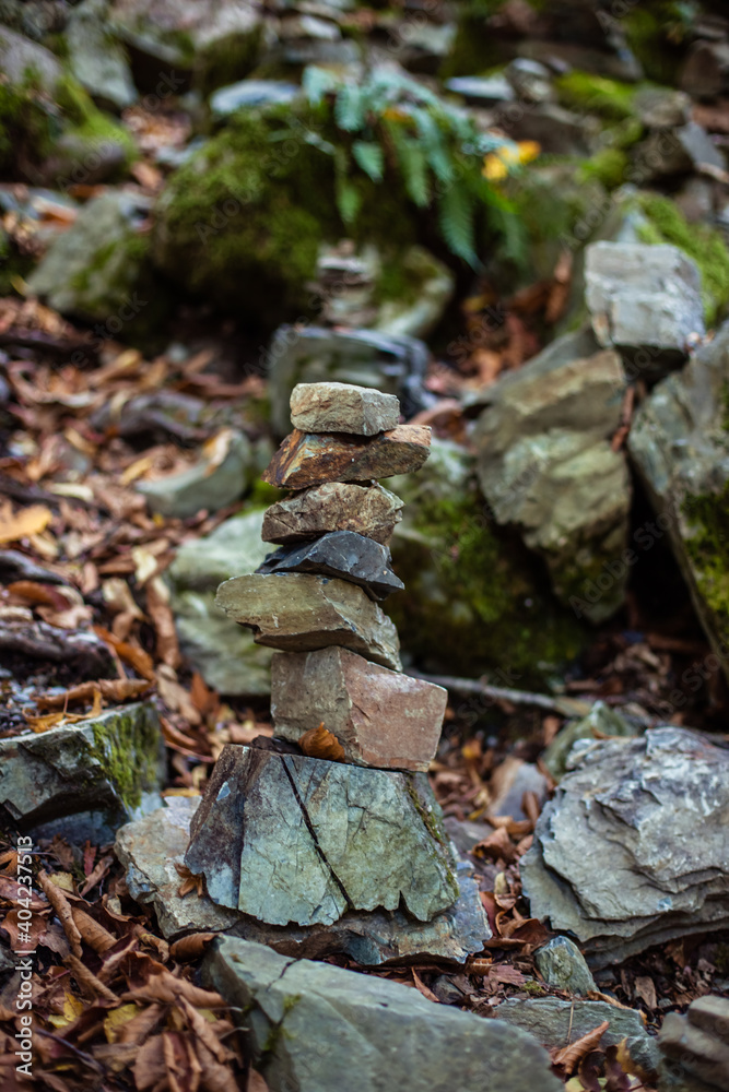 stone stack, tower or pyramid of stones in the forest, balance stone stack, tower or pyramid of stones in the forest, balance