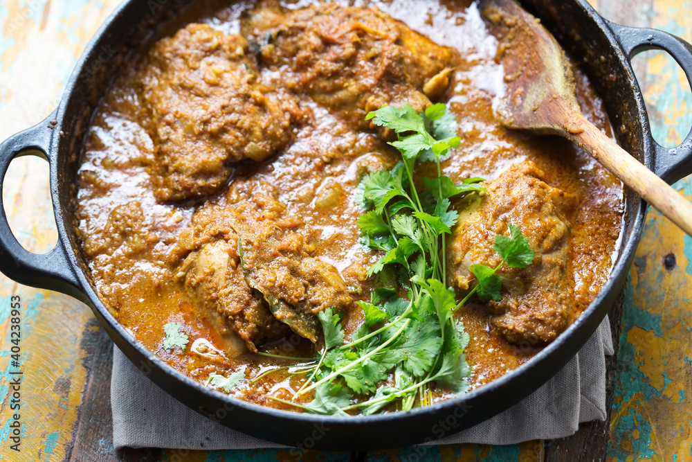 Punjabi chicken curry with coriander. Classic indian masala. Punjabi chicken curry with coriander. Classic indian masala.