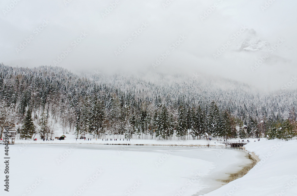 Scenic view of winter landscape with snow covered trees and mountain river in Alps, Slovenia. Beauty of nature concept background. Scenic view of winter landscape with snow covered trees and mountain river in Alps, Slovenia. Beauty of nature concept background.