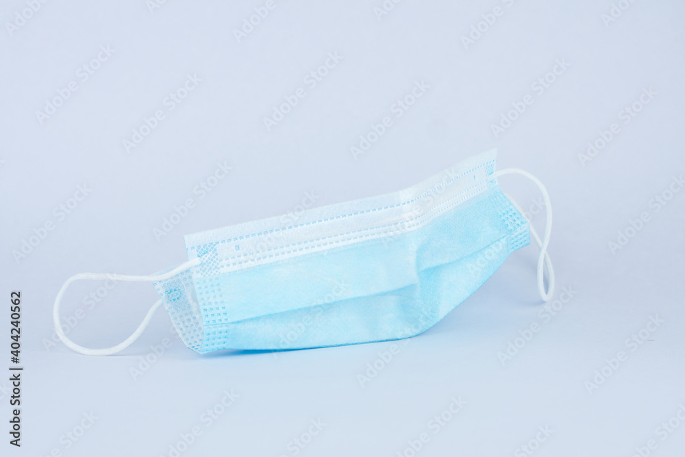 Antivirus mask, protection against coronavirus on a white background, preventing the spread of viruses and COVID-19 outbreaks Antivirus mask, protection against coronavirus on a white background, preventing the spread of viruses and COVID-19 outbreaks