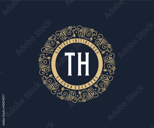 Initial TH Antique retro luxury victorian calligraphic emblem logo with ornamental frame.