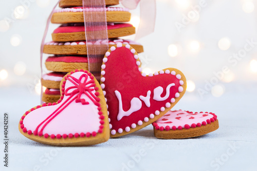 Heart shaped cookies for Valentine's day against blurred lights.