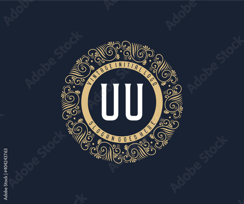 Initial UU Antique retro luxury victorian calligraphic emblem logo with ornamental frame. photo