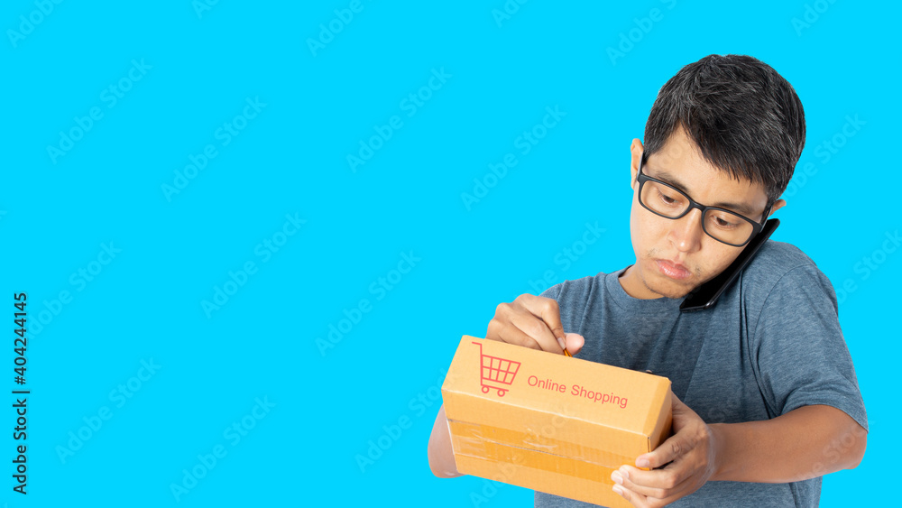 Young Asian man using taking checking online purchase shopping order Young Asian man using taking checking online purchase shopping order