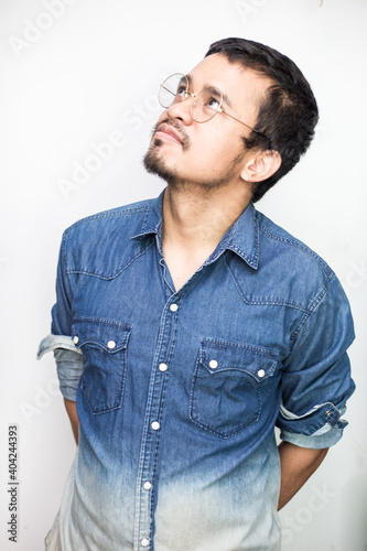 Portrait of handsome beard asian young thoughtful man