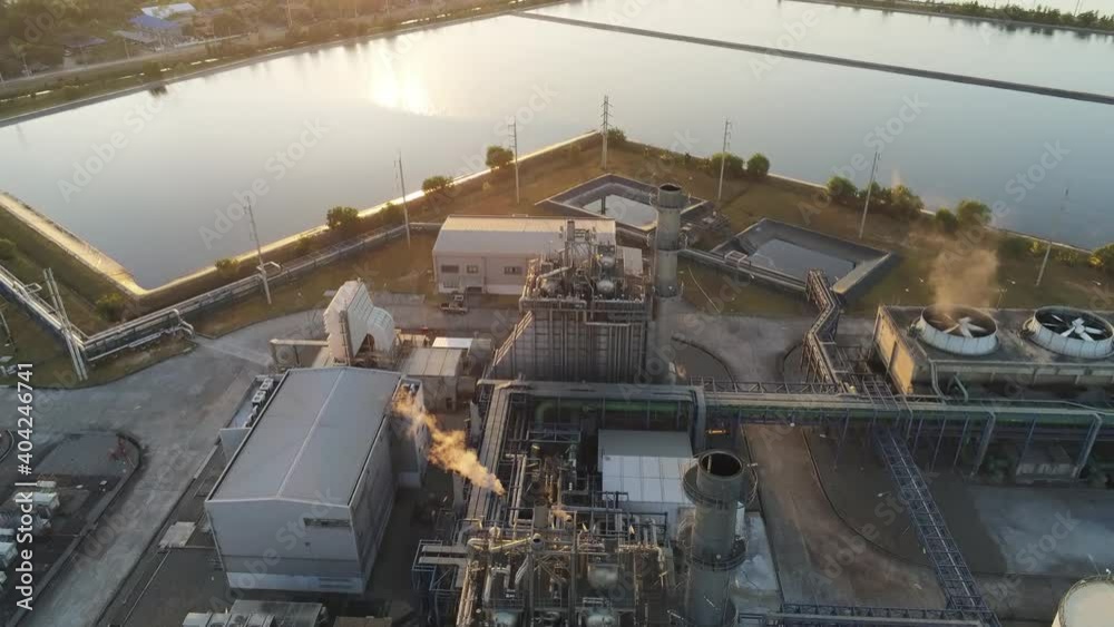 Aerial view of Oil and gas industry facility for storage of oil and petrochemical products.Refinery oil and gas factory power and fuel energy.engineering concept.4k
Aerial view of Oil and gas industry facility for storage of oil and petrochemical products.Refinery oil and gas factory power and fuel energy.engineering concept.4k
