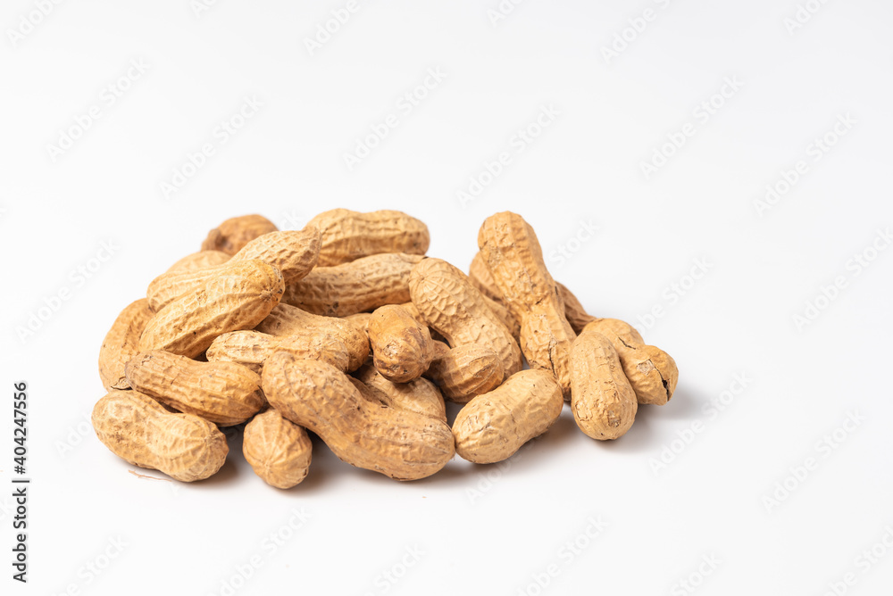 Dried peanuts in closeup isolated on white background. Copy space Dried peanuts in closeup isolated on white background. Copy space