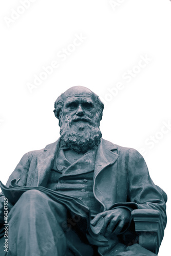 Statue of Charles Darwin isolated on a white background.  With colour toning