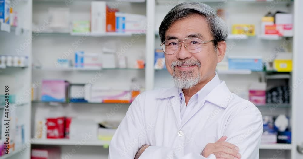 Portrait of senior doctor posing at he shop. He looking to camera with smiling at drugstore. Portrait of senior doctor posing at he shop. He looking to camera with smiling at drugstore.