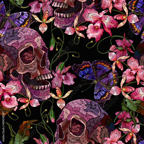 Embroidery human skull, butterflies and pink orchid flowers. Tropical seamless pattern. Medieval style. Fashion clothes template and t-shirt design. Dark gothic art