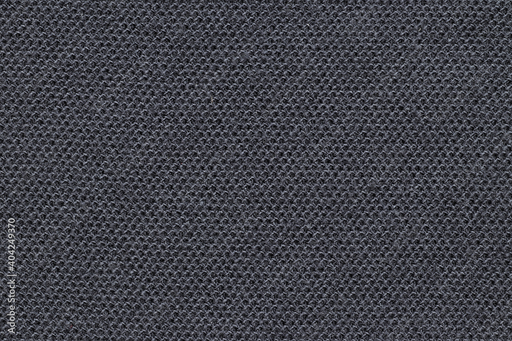The texture of the dark cotton fabric of T-shirts. The texture of the dark cotton fabric of T-shirts.
