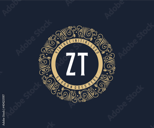 Initial ZT Antique retro luxury victorian calligraphic emblem logo with ornamental frame. photo