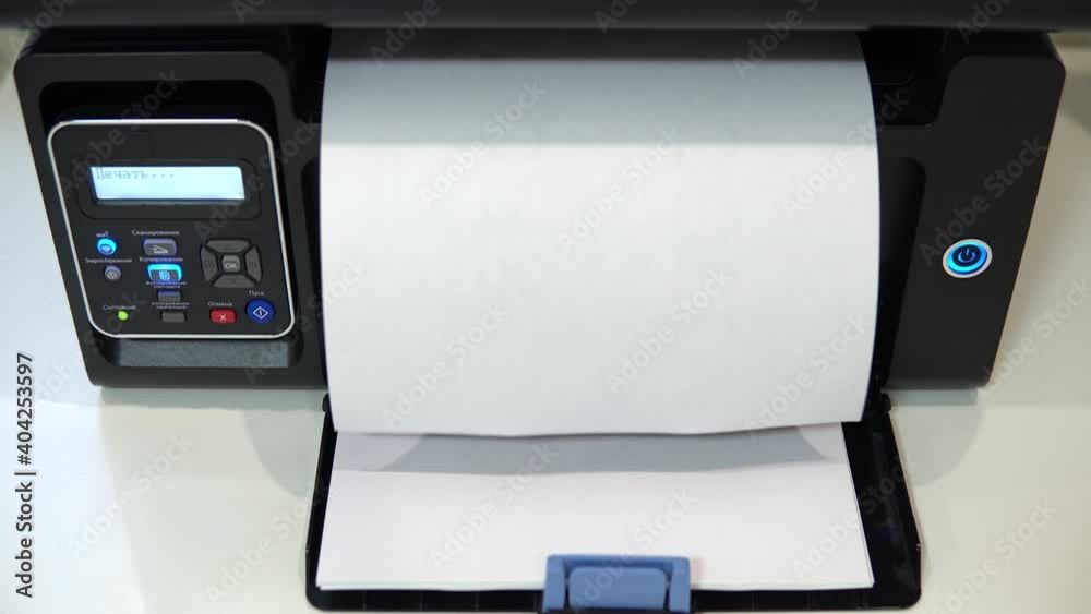 The printer on the table printed the text where is the report on a piece of paper The printer on the table printed the text where is the report on a piece of paper