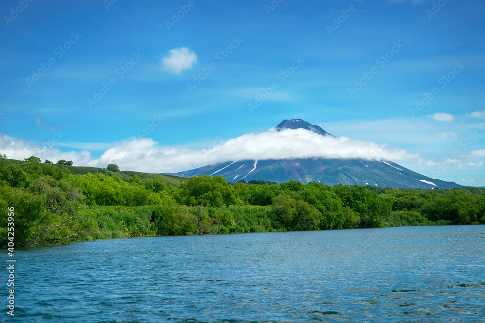 View from the Kuril lake to the Ilyinsky volcano. View from the Kuril lake to the Ilyinsky volcano.