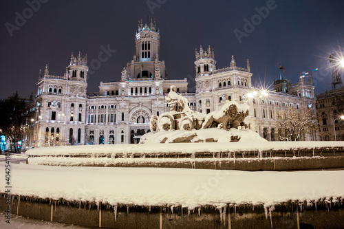 La Cibeles y el ayuntamiento de Madrid nevado photo