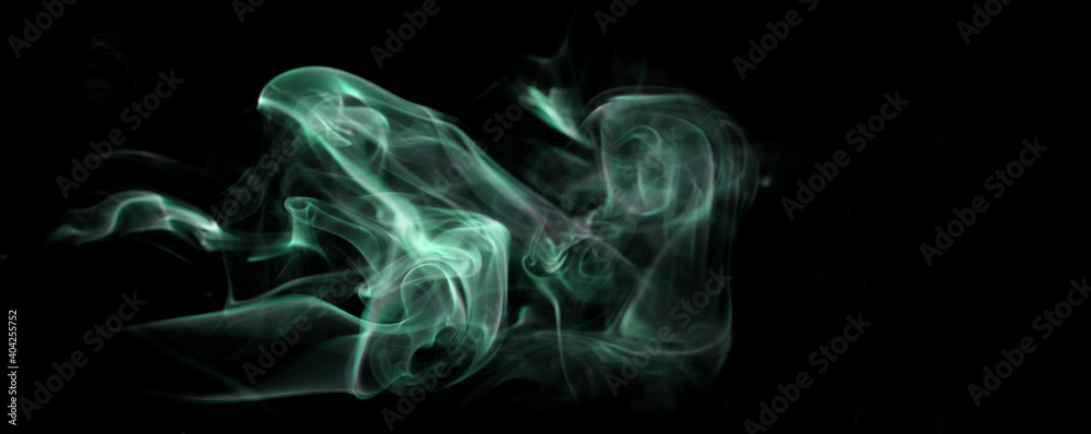Fototapeta premium green isolated smoke on black background