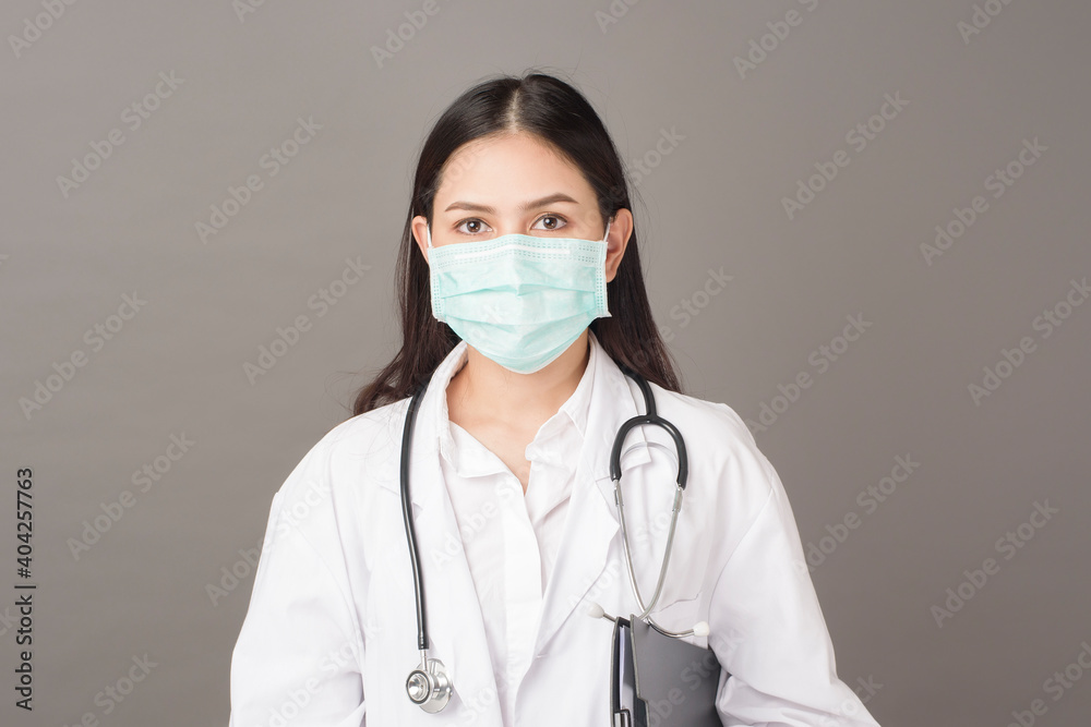 Smart woman doctor is holding stethoscope Smart woman doctor is holding stethoscope