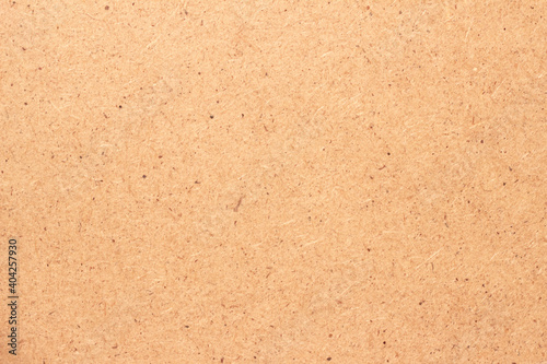 The surface of hardboard (wood-fiber board).